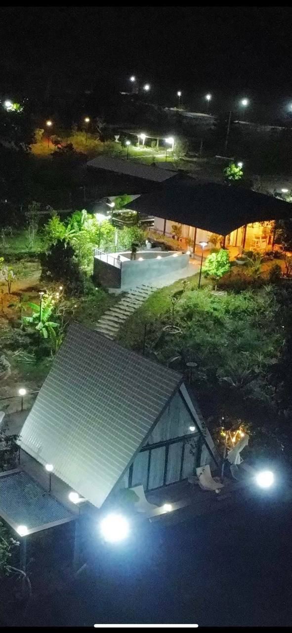 The property lit up at night