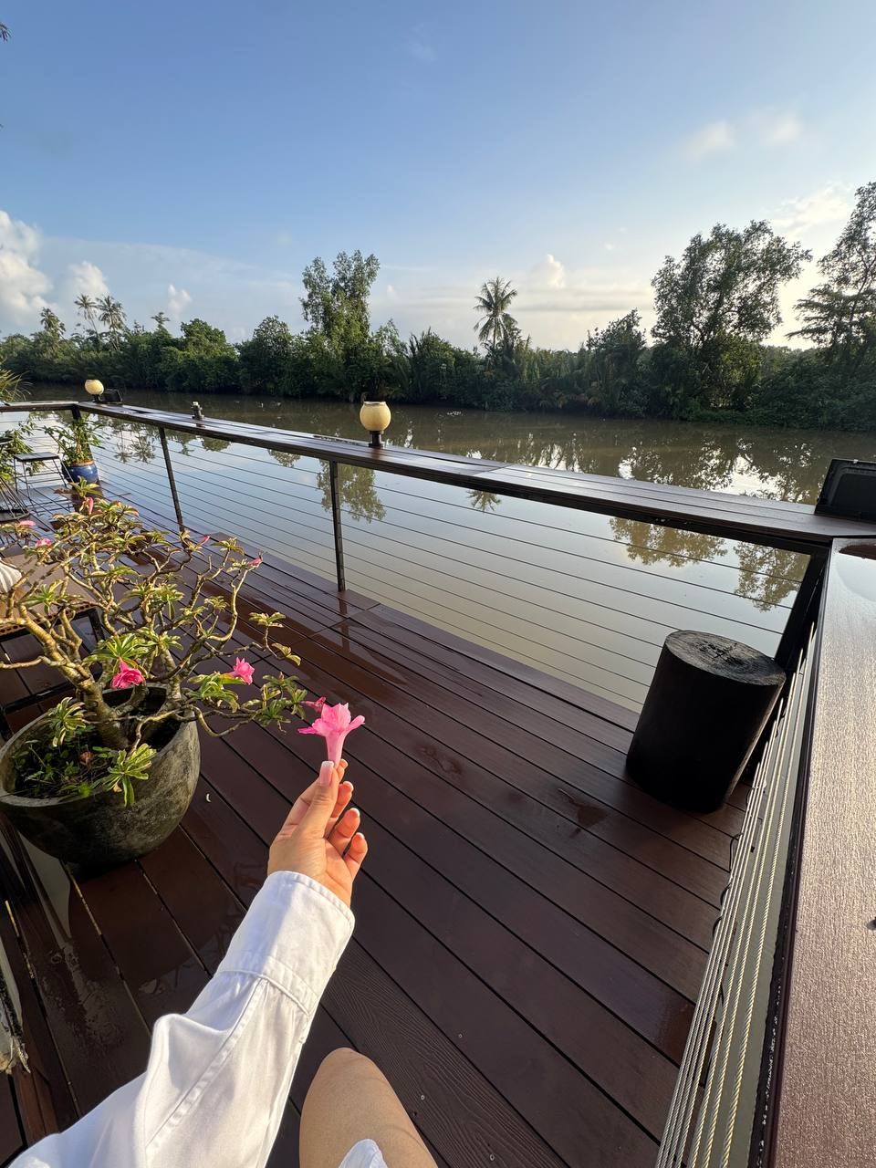 Relaxing on the deck above the river